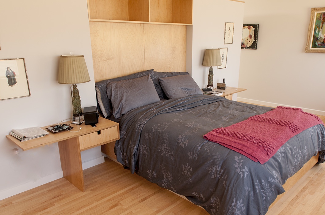 Master bedroom with built-in headboard and nightstands